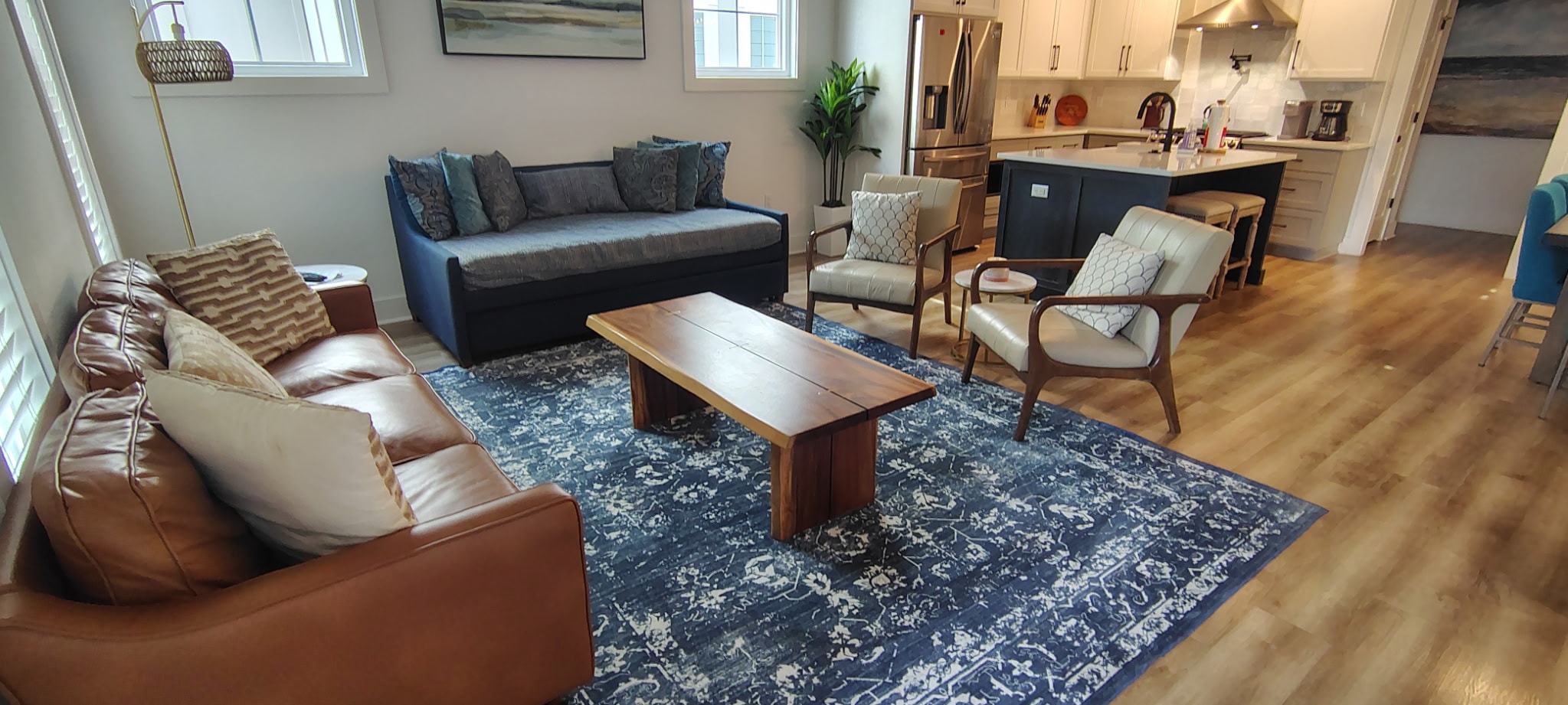 Spotless open-concept living room and kitchen after cleaning